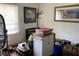 A cluttered bedroom features natural light from a window and personal items at 104 22Nd Street E Ct, Bradenton, FL 34208