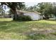 Quaint single-story home with a lush green lawn at 104 22Nd Street E Ct, Bradenton, FL 34208