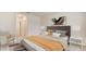 Inviting bedroom featuring neutral tones, soft bedding, and artwork for a relaxing atmosphere at 10821 Gentle Current Way, Parrish, FL 34219