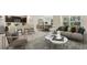 Open-concept living space combining kitchen, dining, and living areas for relaxed living and entertaining at 10821 Gentle Current Way, Parrish, FL 34219