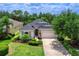 Well-manicured home with a two-car garage at 11794 Forest Park Cir, Bradenton, FL 34211