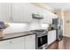 Updated kitchen with stainless steel appliances and sleek countertops at 11794 Forest Park Cir, Bradenton, FL 34211