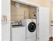 Convenient laundry room featuring a modern washer and dryer for easy laundry care at 11794 Forest Park Cir, Bradenton, FL 34211
