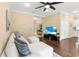 Spacious living room with dark wood floors and a view of the kitchen at 11794 Forest Park Cir, Bradenton, FL 34211