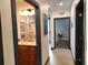 Nicely decorated bathroom with wood cabinets, granite countertops, and stylish accents at 1241 Riverscape St # B, Bradenton, FL 34208