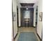 Elegant foyer with tiled floor, archways, and modern decor creating a welcoming entrance at 1241 Riverscape St # B, Bradenton, FL 34208