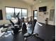 Well-lit gym with treadmills, stationary bikes, and weight training equipment at 1241 Riverscape St # B, Bradenton, FL 34208