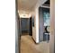 Hallway with blue accent wall, modern decor, and tile flooring at 1241 Riverscape St # B, Bradenton, FL 34208