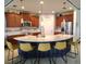 Open kitchen with a large island, modern countertops, pendant lighting, and stainless steel appliances at 1241 Riverscape St # B, Bradenton, FL 34208