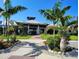 Inviting community clubhouse with well-manicured landscaping and a welcoming entrance at 1241 Riverscape St # B, Bradenton, FL 34208