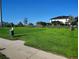 Expansive community lawn area, perfect for outdoor activities with lush greenery and open space at 1241 Riverscape St # B, Bradenton, FL 34208