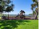 Fun playground with a wooden play structure and slide by the water's edge at 1241 Riverscape St # B, Bradenton, FL 34208