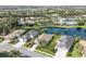 Stunning aerial view of homes backing onto a serene lake in a beautiful community at 12908 Crystal Clear Pl, Bradenton, FL 34211