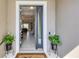 Inviting foyer with tile flooring and view to the living area at 12908 Crystal Clear Pl, Bradenton, FL 34211
