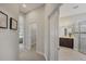Hallway view leading to the bathroom and bedroom areas, showcasing the home's layout at 12908 Crystal Clear Pl, Bradenton, FL 34211