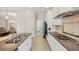 Bright kitchen boasting granite countertops, stainless steel appliances, and ample cabinet space at 12908 Crystal Clear Pl, Bradenton, FL 34211