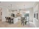 Spacious kitchen featuring an island with bar seating, and a dinette area, great for entertaining at 12908 Crystal Clear Pl, Bradenton, FL 34211