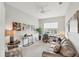 Comfortable office space with a sofa, desk, and art, providing a peaceful work environment at 12908 Crystal Clear Pl, Bradenton, FL 34211