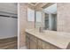Bathroom with small cabinet sink and closet entrance at 1312 73Rd Nw St, Bradenton, FL 34209