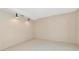 A bedroom featuring tile floors, neutral walls, and simple lighting at 1312 73Rd Nw St, Bradenton, FL 34209