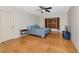Bedroom with hardwood floors, ceiling fan, bay window and plantation shutters at 1312 73Rd Nw St, Bradenton, FL 34209