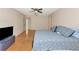 Bedroom with hardwood floors and view to entry door and another room at 1312 73Rd Nw St, Bradenton, FL 34209