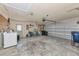 Spacious garage featuring concrete flooring, laundry, and plenty of room for parking and storage at 1312 73Rd Nw St, Bradenton, FL 34209