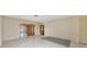Open floor plan with tile flooring and neutral walls offering seamless transitions between living spaces at 1312 73Rd Nw St, Bradenton, FL 34209