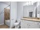 Bathroom features a granite countertop and a vanity with a sink at 17118 Vardon Ter # 404, Bradenton, FL 34211