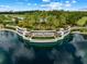Elegant entrance to Lakewood National, surrounded by water and lush greenery at 17118 Vardon Ter # 404, Bradenton, FL 34211