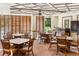 The clubhouse provides tables and chairs for tenants to use and socialize with each other at 1800 Benjamin Franklin Dr # B1009, Sarasota, FL 34236