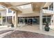 Elegant entrance with brick paving and large glass doors, leading to a luxurious lobby at 1800 Benjamin Franklin Dr # B1009, Sarasota, FL 34236
