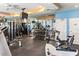 Well-appointed gym with a variety of exercise equipment and bright, airy space at 1800 Benjamin Franklin Dr # B1009, Sarasota, FL 34236