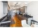 Modern kitchen features stainless steel appliances, granite countertops, and sleek gray cabinetry and an open floor plan at 1800 Benjamin Franklin Dr # B1009, Sarasota, FL 34236