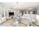 Bright living area with elegant furnishings and decor at 1800 Benjamin Franklin Dr # B1009, Sarasota, FL 34236