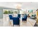 Bright lobby area with modern furnishings, elegant lighting, and direct outdoor access at 1800 Benjamin Franklin Dr # B1009, Sarasota, FL 34236