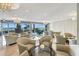 Bright lobby with comfortable seating, large windows, and views of the beach at 1800 Benjamin Franklin Dr # B1009, Sarasota, FL 34236