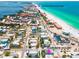 Gorgeous aerial view showing the property's proximity to the beach, Bridge Street, and the City Pier at 2201 Avenue C, Bradenton Beach, FL 34217