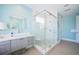 Bright bathroom featuring a glass shower, modern vanity and stylish fixtures, offering a spa-like experience at 2201 Avenue C, Bradenton Beach, FL 34217