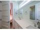 Clean bathroom featuring dual sinks, a white countertop, and modern fixtures at 2201 Avenue C, Bradenton Beach, FL 34217