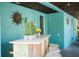 Poolside bar with counter seating and decorative accents, perfect for entertaining and relaxation at 2201 Avenue C, Bradenton Beach, FL 34217