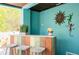 Outdoor bar offers a unique entertainment space with colorful accents, seating, and a relaxed vibe at 2201 Avenue C, Bradenton Beach, FL 34217