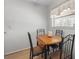 Bright breakfast nook features a small table with seating and a sunlit window at 2503 Beneva Rd # 7, Sarasota, FL 34232