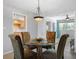 Bright dining area connects to the kitchen and living room, perfect for entertaining at 2503 Beneva Rd # 7, Sarasota, FL 34232