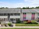 Exterior view of a condominium with lush landscaping at 2503 Beneva Rd # 7, Sarasota, FL 34232