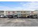 Exterior shot of condo building featuring covered parking at 2503 Beneva Rd # 7, Sarasota, FL 34232