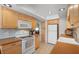Well-lit kitchen featuring ample counter space, cabinetry, and modern appliances at 2503 Beneva Rd # 7, Sarasota, FL 34232