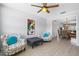 Bright living room showcasing seating arrangement, ceiling fan, and a dining area at 2503 Beneva Rd # 7, Sarasota, FL 34232