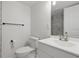 This bathroom features marble tile, modern fixtures, and a sleek design at 2652 26Th St, Sarasota, FL 34234