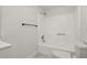 This bathroom features a tiled shower and tub combination with updated fixtures at 2652 26Th St, Sarasota, FL 34234